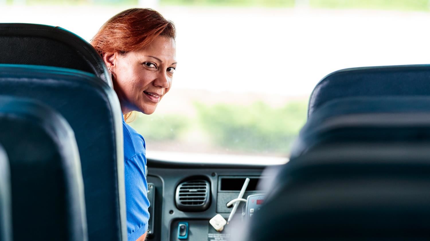bus driver looking back